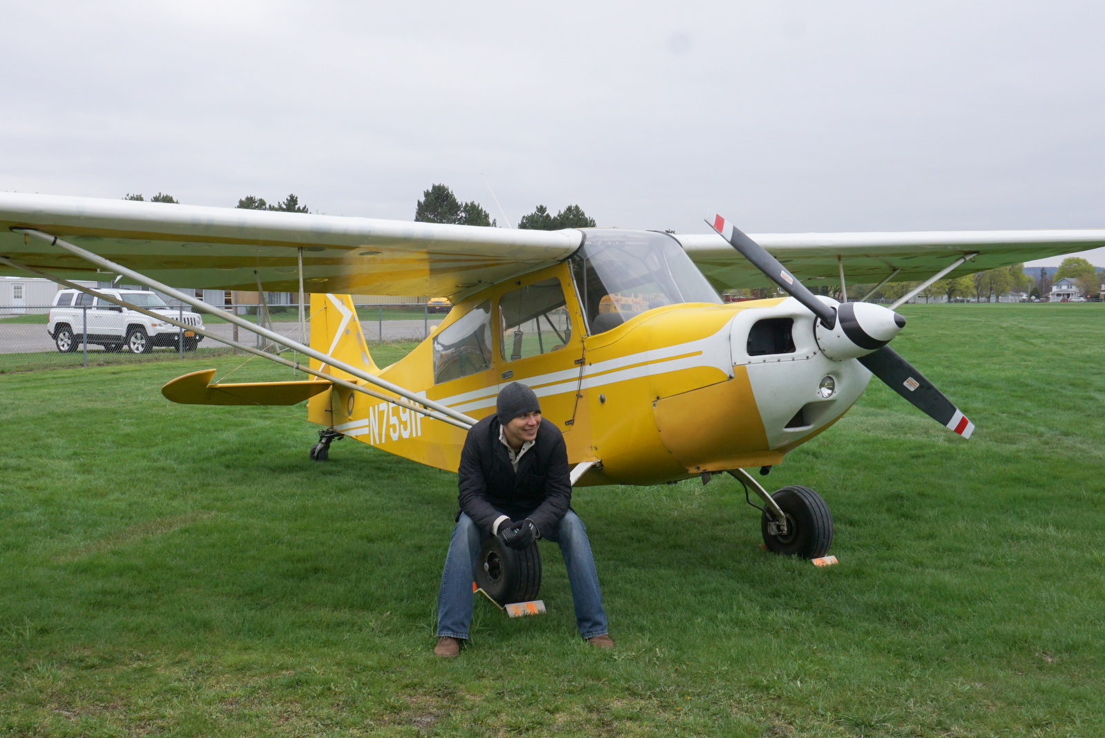 Yellow Citabria on the field